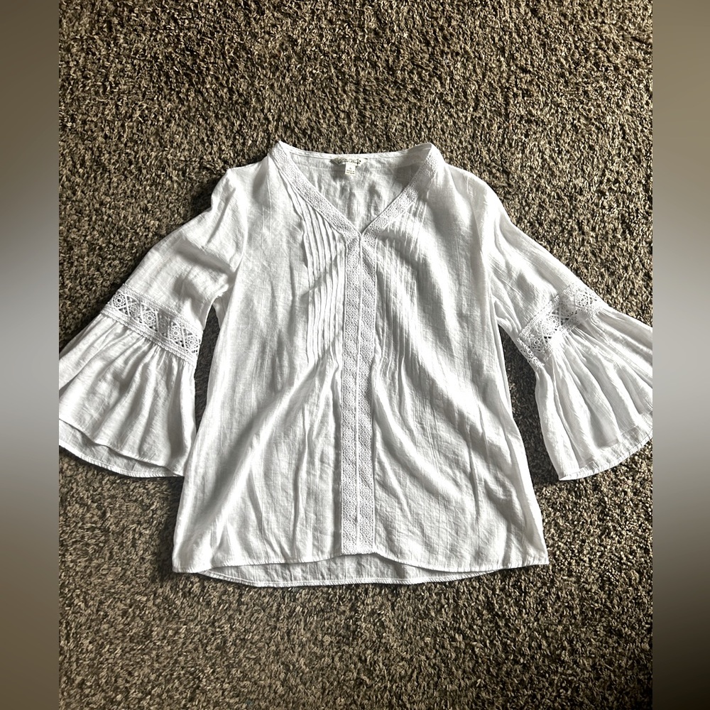 White pioneer women flown top.